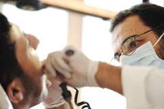 A dental patient getting treatment while sedated