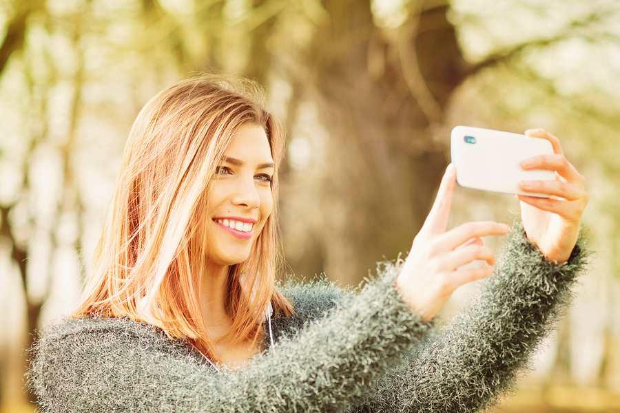 Kick Your Selfie Game into Gear with Dental Implants 