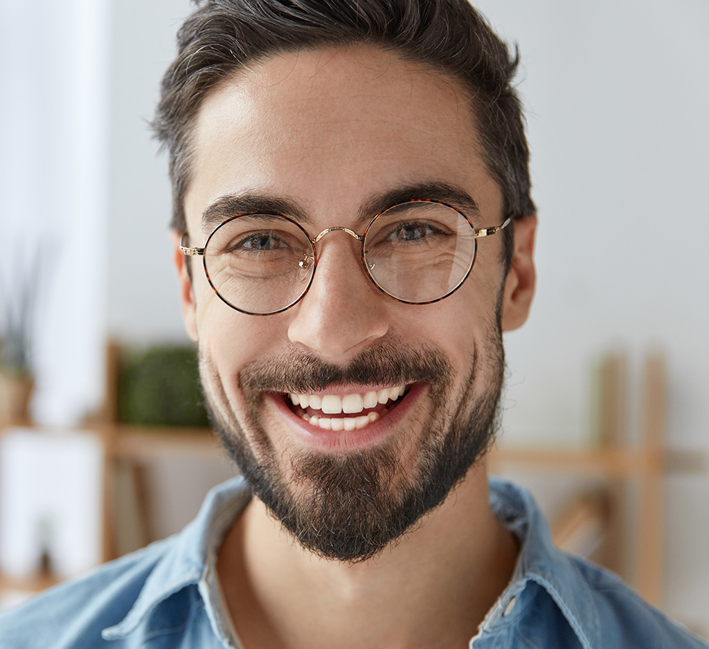 smiling man wearing glasses