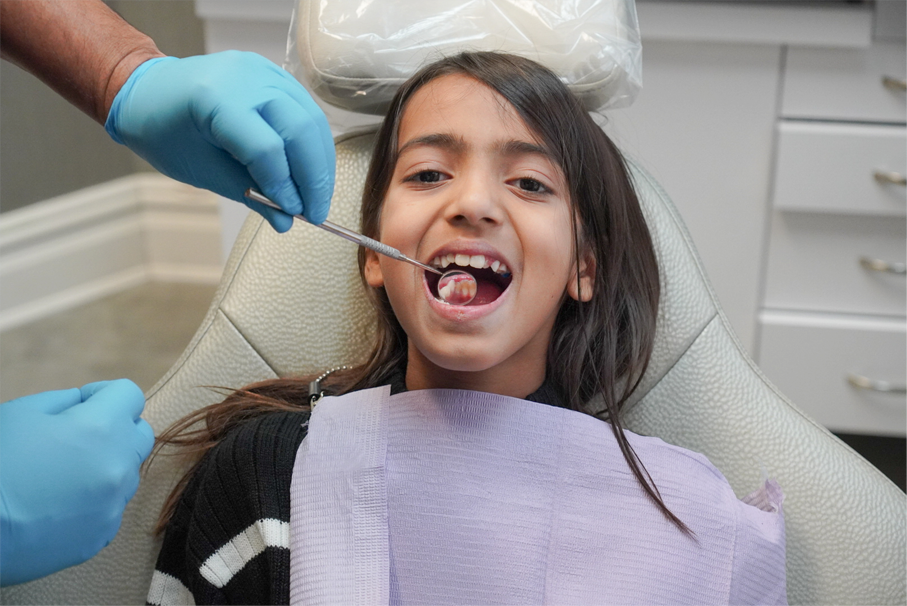 Child getting a dental checkup 